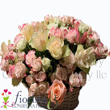 Composition of mixed roses in a basket